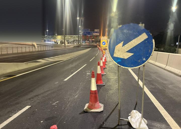 Keep-left sign and cone line at a lane closure