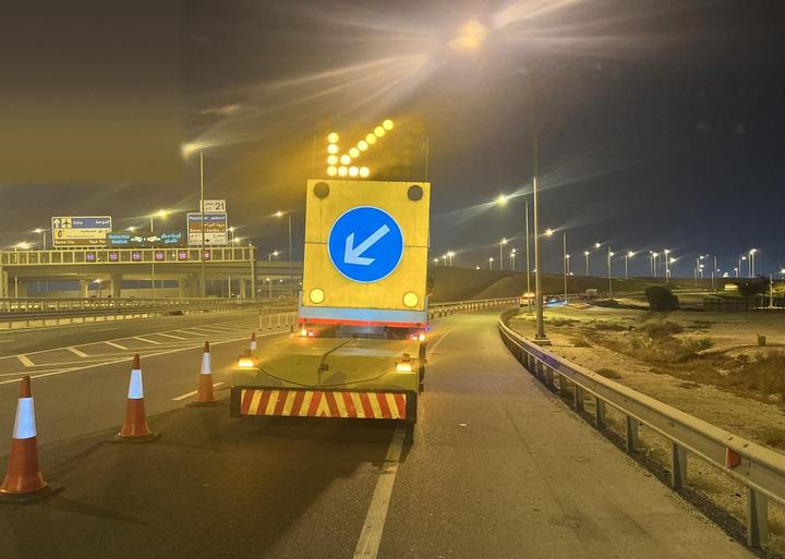 TMA arrow board protecting a closed lane at night
